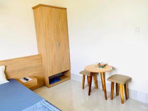 Postel nebo postele na pokoji v ubytování Nhà Nghỉ LÂM ANH