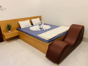 Postel nebo postele na pokoji v ubytování Nhà Nghỉ LÂM ANH