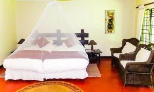 Voodi või voodid majutusasutuse Woodlands Lilongwe toas