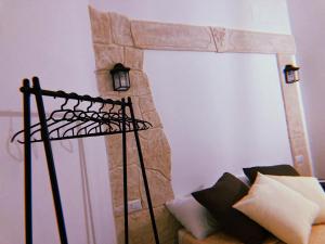 Postel nebo postele na pokoji v ubytování LE ANTICHE MURA