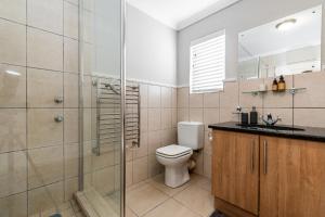 Ένα μπάνιο στο Coral Isle Apartment +4 φωτογραφίες