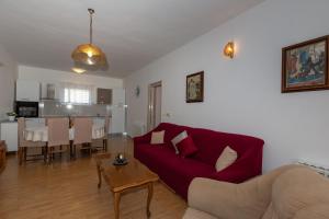 Kuchyň nebo kuchyňský kout v ubytování Apartments Tolic