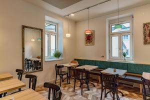 Reštaurácia alebo iné gastronomické zariadenie v ubytovaní Villa Elisa