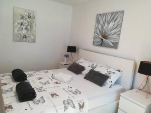 Posteľ alebo postele v izbe v ubytovaní APARTMAN D&D***