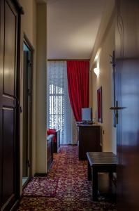 Postel nebo postele na pokoji v ubytování Rubis Hotel