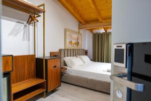 Postel nebo postele na pokoji v ubytování Hotel Semajo