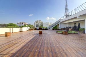 a large deck on the top of a building at Hotel Anand Villa in Agra