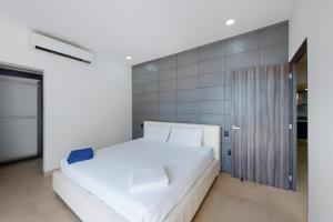 Postel nebo postele na pokoji v ubytování Malecón VG02 at Torre Montevideo + 18 fotografií