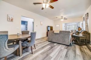 a dining room and living room with a table and chairs at Midtown Modern Farmhouse in San Antonio