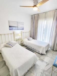 Fotografia z galérie ubytovania PINTA BEACH HOUSE Dúplex con vistas panorámicas v destinácii Málaga