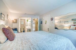 a large bedroom with a large bed in a room at The Bullpen 129 in Neskowin