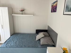 Rúm í herbergi á Pavillon Greve