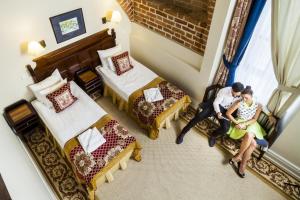 Posteľ alebo postele v izbe v ubytovaní Hotel St. Bruno