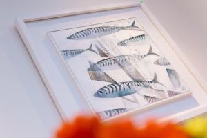 a picture of fishes in a picture frame at Coast in St Ives