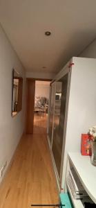 a room with a sliding glass door in a kitchen at Central London 1 bed Apartment in London