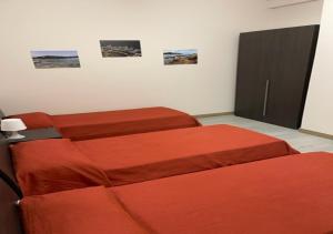 Posteľ alebo postele v izbe v ubytovaní Sissi Comfort Rooms Foresteria Lombarda