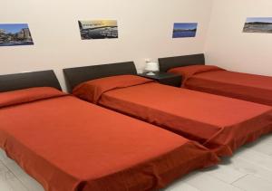 Posteľ alebo postele v izbe v ubytovaní Sissi Comfort Rooms Foresteria Lombarda