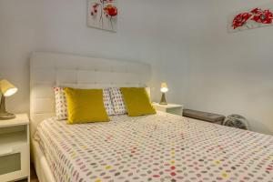 Postel nebo postele na pokoji v ubytování Orlando - Ocean View Apartment in Costa Adeje + 30 fotografií