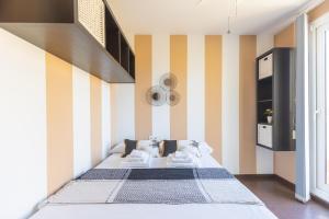 Postel nebo postele na pokoji v ubytování Villa Ottavio Golden Park