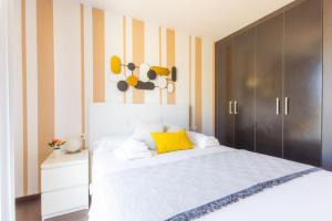 Postel nebo postele na pokoji v ubytování Villa Ottavio Golden Park