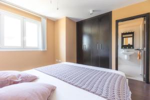 Postel nebo postele na pokoji v ubytování Villa Ottavio Golden Park