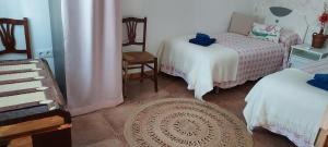 Postel nebo postele na pokoji v ubytování La Casa De Las Abuelas