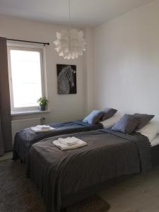 Postel nebo postele na pokoji v ubytování Quality apartments in city center