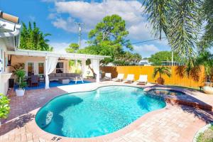 The swimming pool at or close to Beautiful Pompano Beach retreat! Salt water pool!
