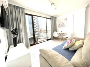 TV a/nebo společenská místnost v ubytování Payma Apartments Benidorm