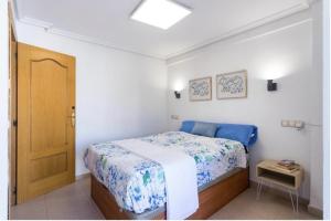 Postel nebo postele na pokoji v ubytování Payma Apartments Benidorm