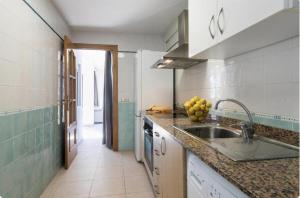Kuchyň nebo kuchyňský kout v ubytování Payma Apartments Benidorm