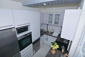 Kuchyň nebo kuchyňský kout v ubytování Kinder Apartman