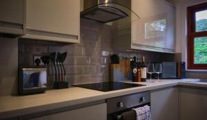 Kuchnia lub aneks kuchenny w obiekcie Tig Cottage - a rural, quirky, pet friendly 2 bedroom cottage near Ballantrae