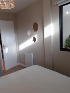 Postel nebo postele na pokoji v ubytování Kalee