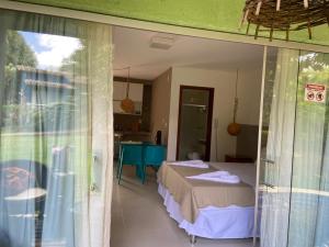 Letto o letti in una camera di Villas do Pratagy Jambo I com Jacuzzy