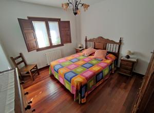 Postel nebo postele na pokoji v ubytování La Huertona