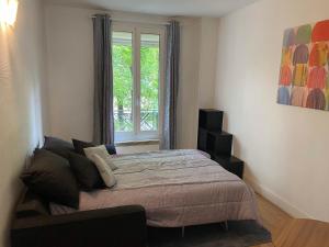 Posteľ alebo postele v izbe v ubytovaní Trendy 2 Rooms Paris 13