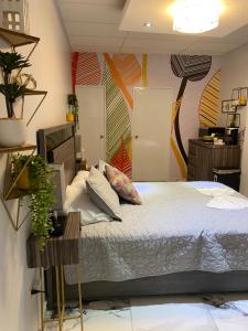 Itza-Bella Suites 객실 침대