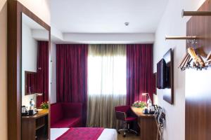 Katil atau katil-katil dalam bilik di Ramada Encore By Wyndham Tangier