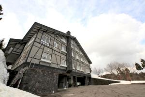 a building with a white rope around it at Koguriyama Sanso - Vacation STAY 37452v in Minami Uonuma