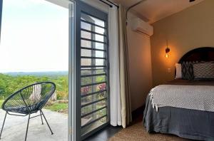Postel nebo postele na pokoji v ubytování Lejos Eco Retreat