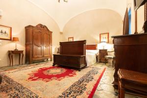 Postel nebo postele na pokoji v ubytování Hotel Il Campanile