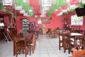 Restaurant o un lloc per menjar a Hotel Bacaanda