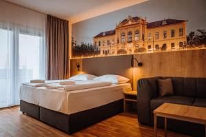 Rúm í herbergi á Hotel Am Sachsengang