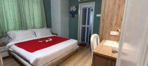 Postel nebo postele na pokoji v ubytování Sunshine Homestay