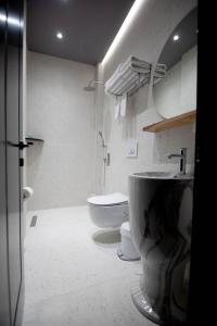 Koupelna v ubytování Mergan Hotel