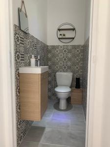 Koupelna v ubytování Gite chez Carolanne et Julien