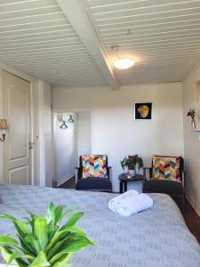 Rúm í herbergi á Sunbjerre B&B