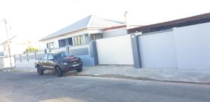 a truck parked in front of a house at PEACE LODGE in Cape Town