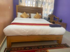 Thanapati Guesthouse客房内的一张或多张床位